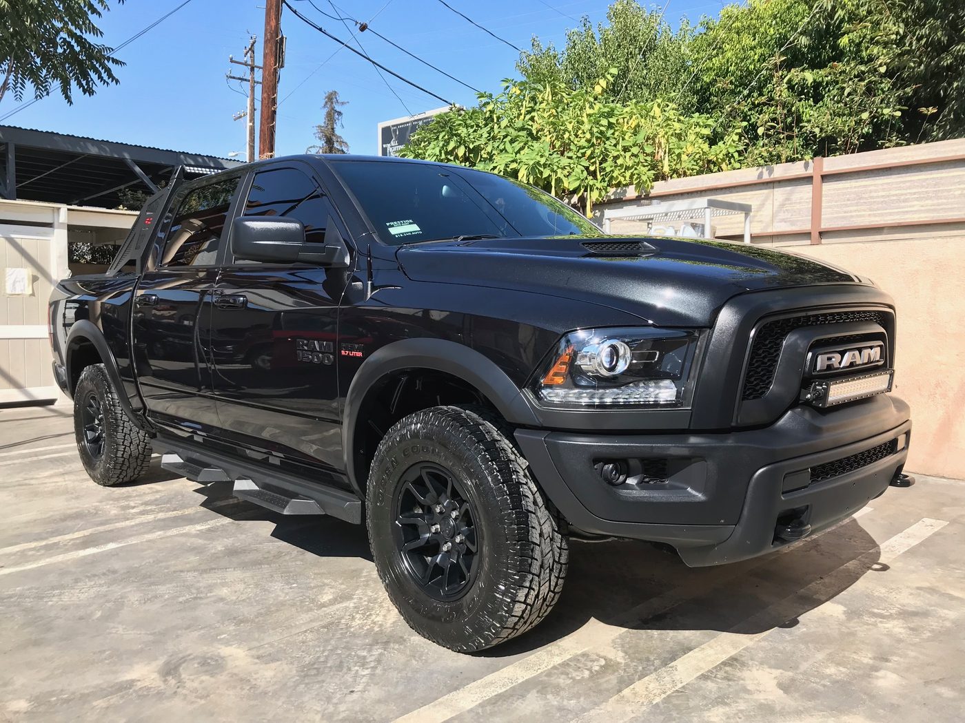 Same Black Ram 1500 truck after full-service wash, glossy black finish at Fair Oaks Car Wash