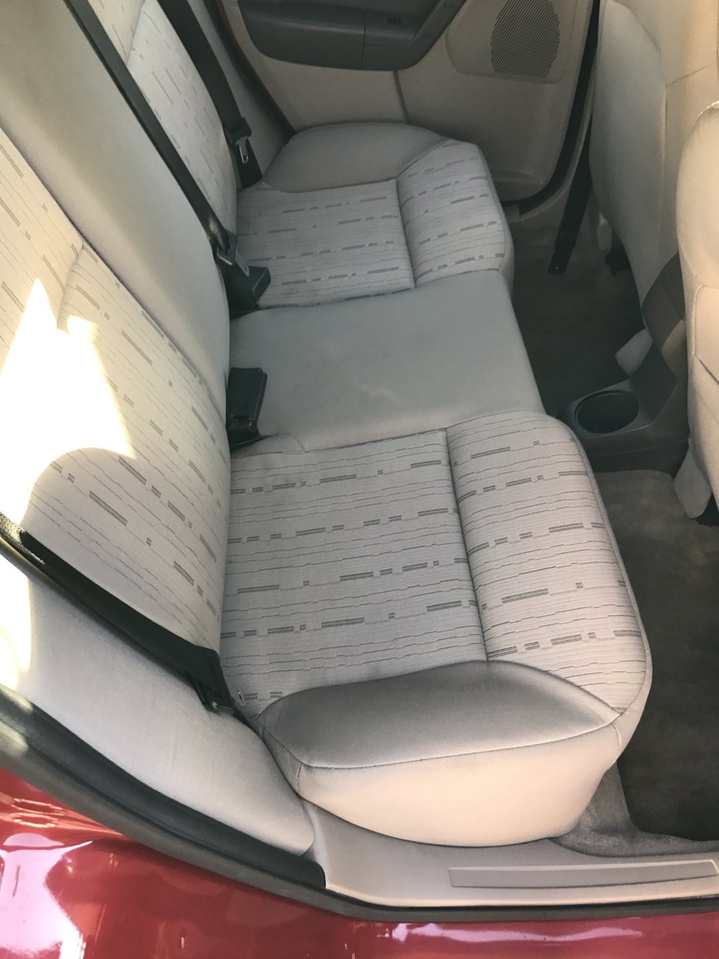 Freshly cleaned cloth interior seats after Interior Detail at Fair Oaks Car Wash