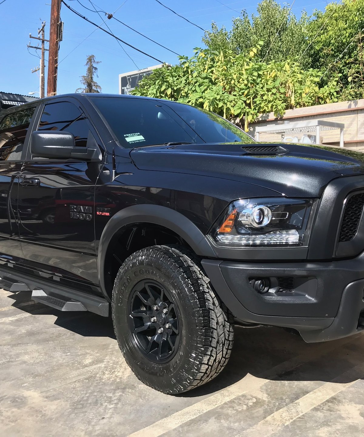 Glossy black Ram 1500 truck after detail at Fair Oaks Car Wash, showing deep clean finish on paint and wheels